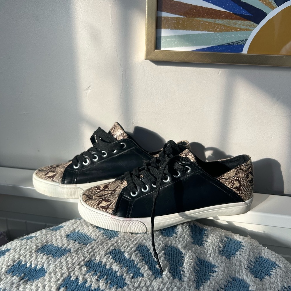 Restricted brand black and snake print sneakers